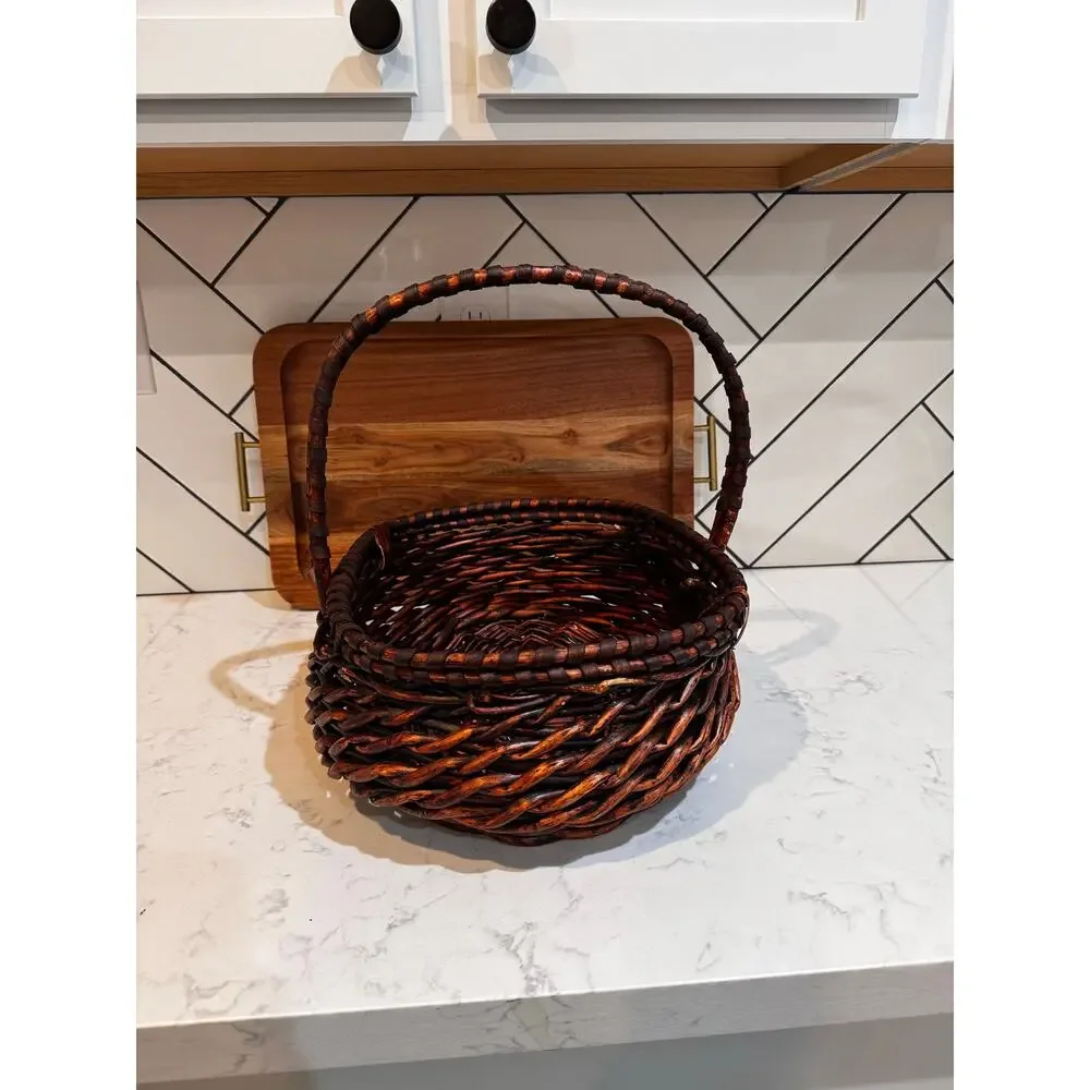 dark stained willow basket rustic handwoven texture sturdy center handle vintage